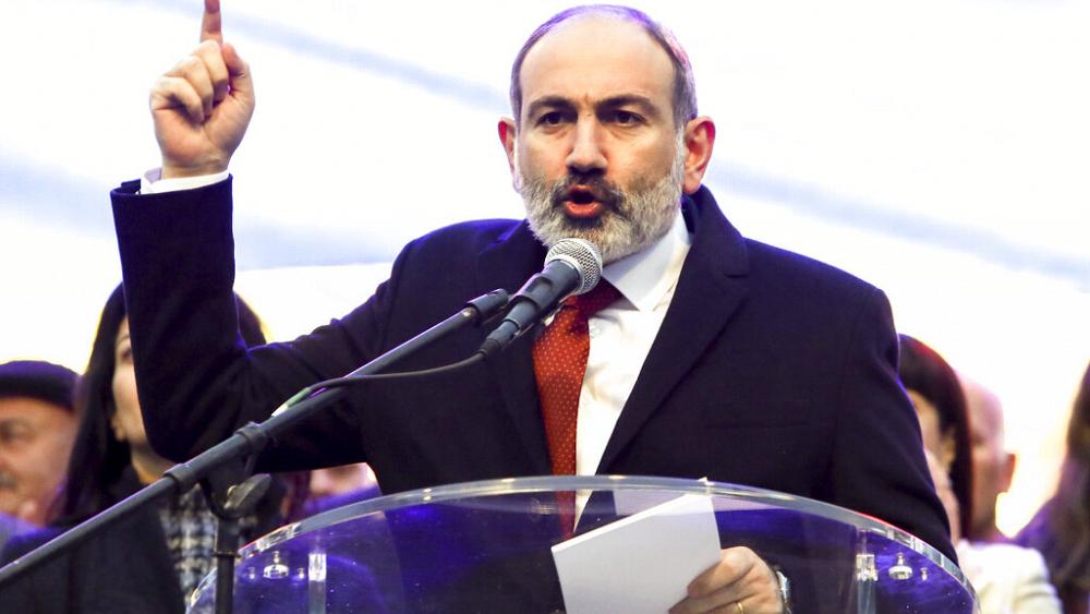 Armenia’s PM calls early elections in a bid to defuse country’s political crisis