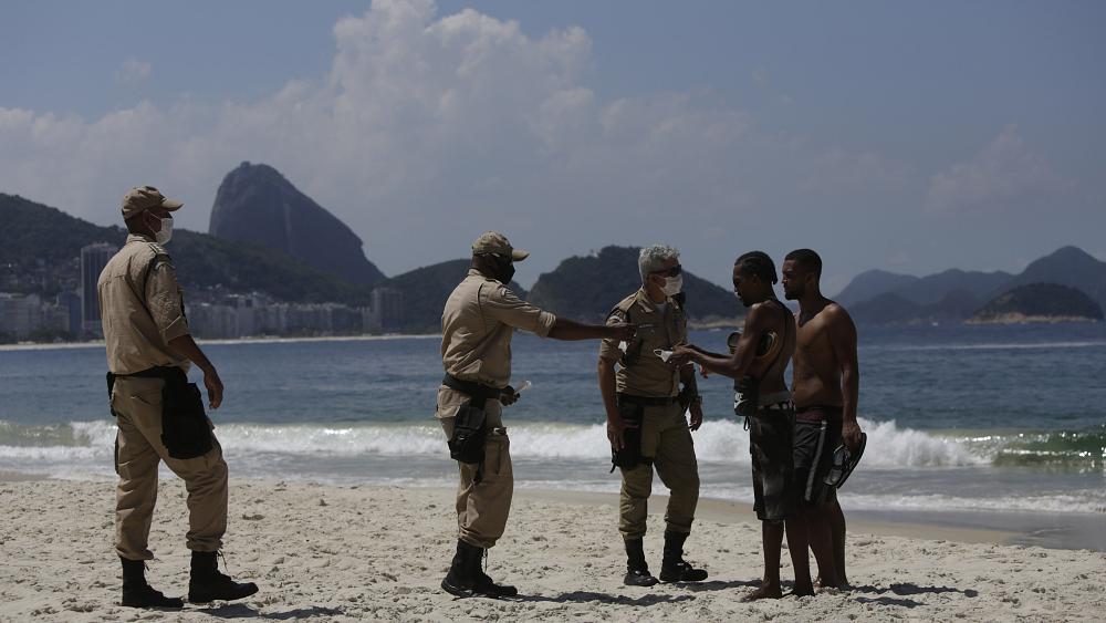 COVID-19 forces closure of iconic beaches in Rio de Janeiro and Miami