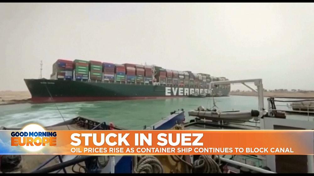 Suez Canal: Owner of wedged container ship apologises