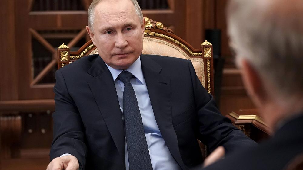 Putin signs law allowing him two more terms as Russia's leader