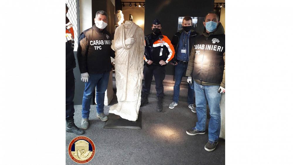 Stolen Roman statue recovered by Italian art police after chance discovery in Belgium