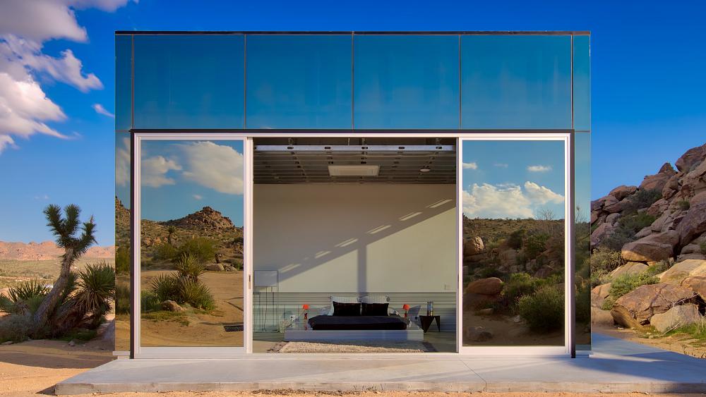 Tour the incredible holiday house that mirrors the Californian desert and has its own mountain