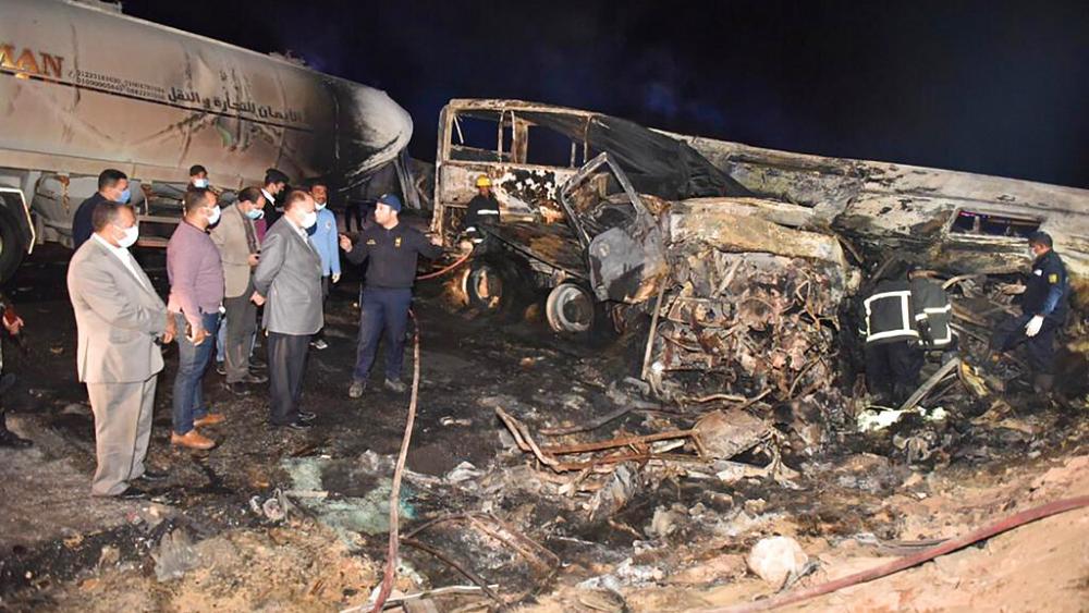 Fuel tanker's crash with a bus kills 20 in Egypt