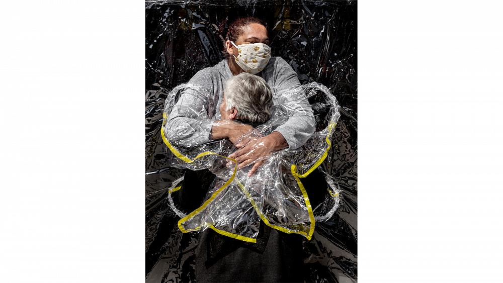 World Press Photo: Image of Brazil nursing home hug wins 2021 award