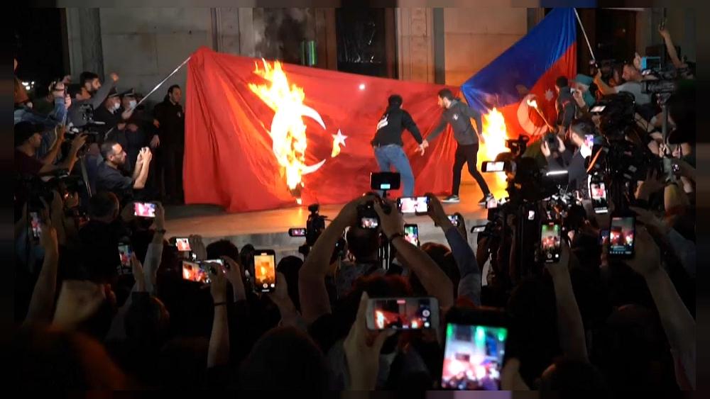 Marchers in Armenia burn Turkish flag on anniversary of 1915 massacres