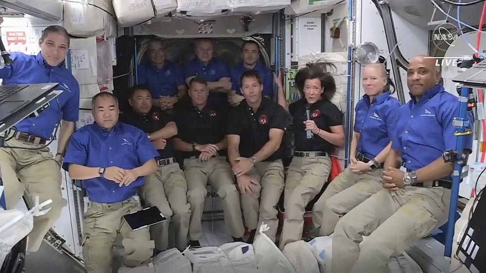 Four astronauts on Elon Musk's SpaceX capsule dock at International Space Station