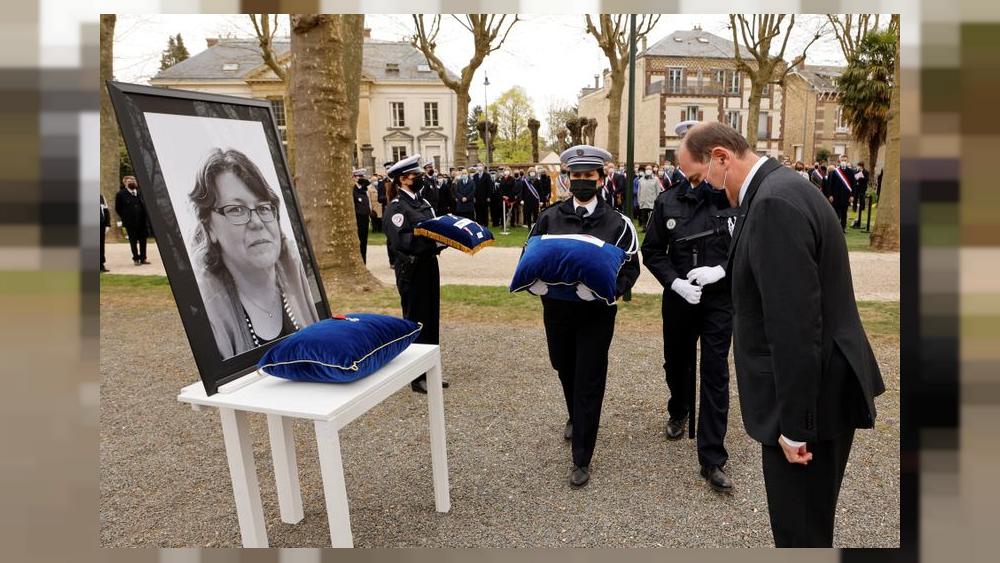 French PM pays tribute to slain police worker