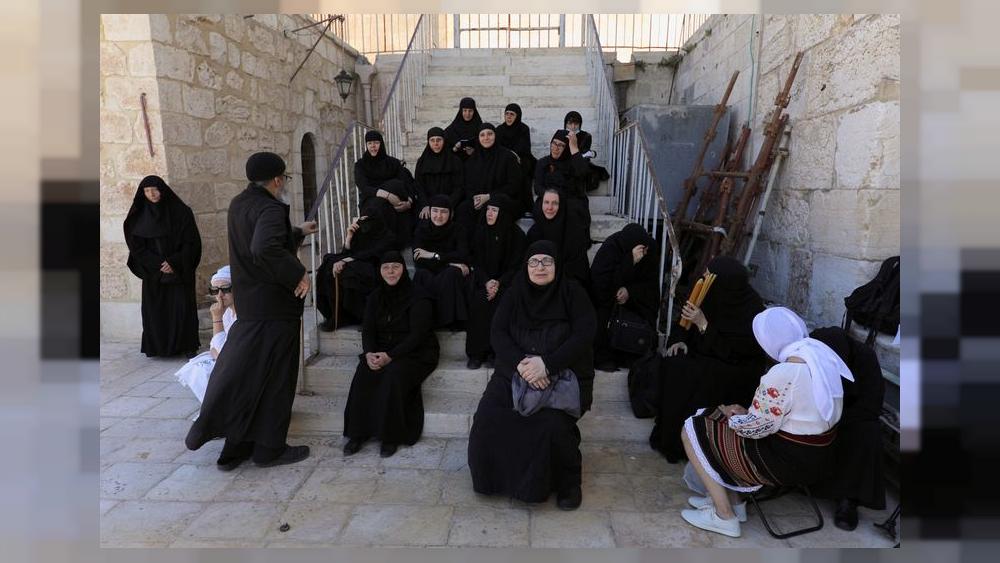 Crowds gather for Holy Fire ceremony at Jerusalem's Holy Sepulchre