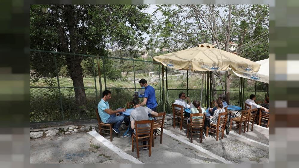 "Like old times again" as Greece re-opens bars and restaurants