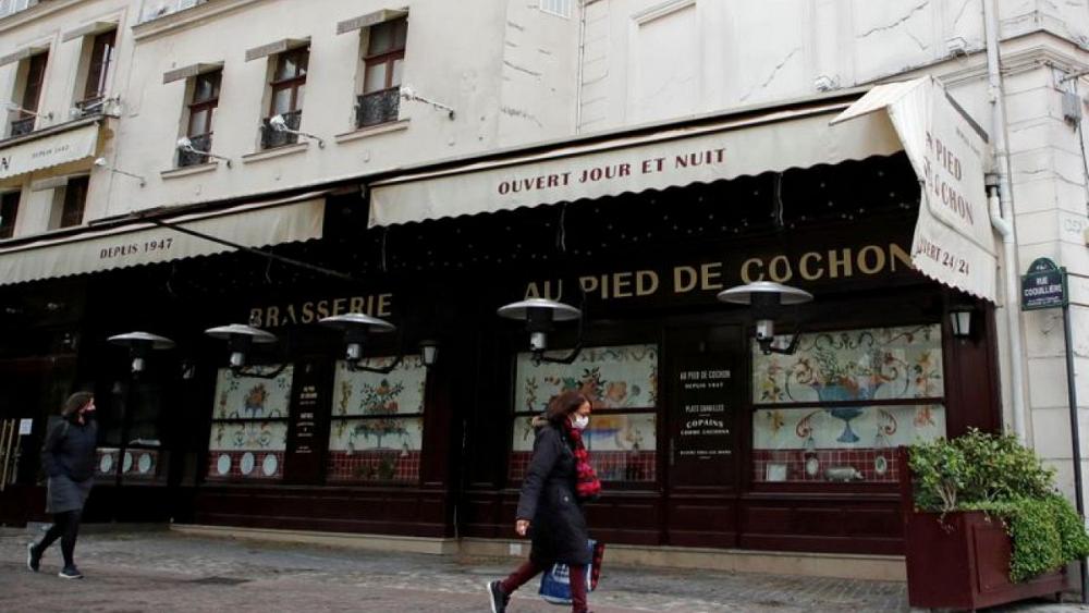 France's new daily COVID-19 cases fall to a 2021 low