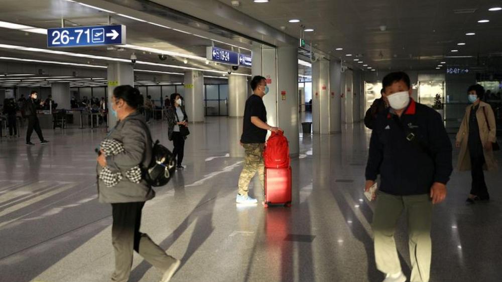 China reports 14 new COVID-19 cases vs 11 a day earlier