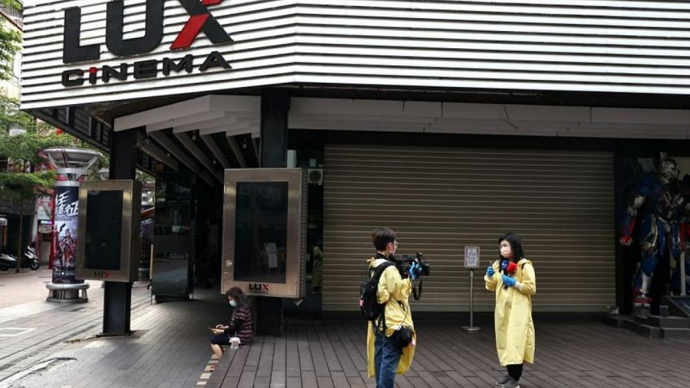 Taiwan tightens curbs after surge in domestic COVID-19 cases