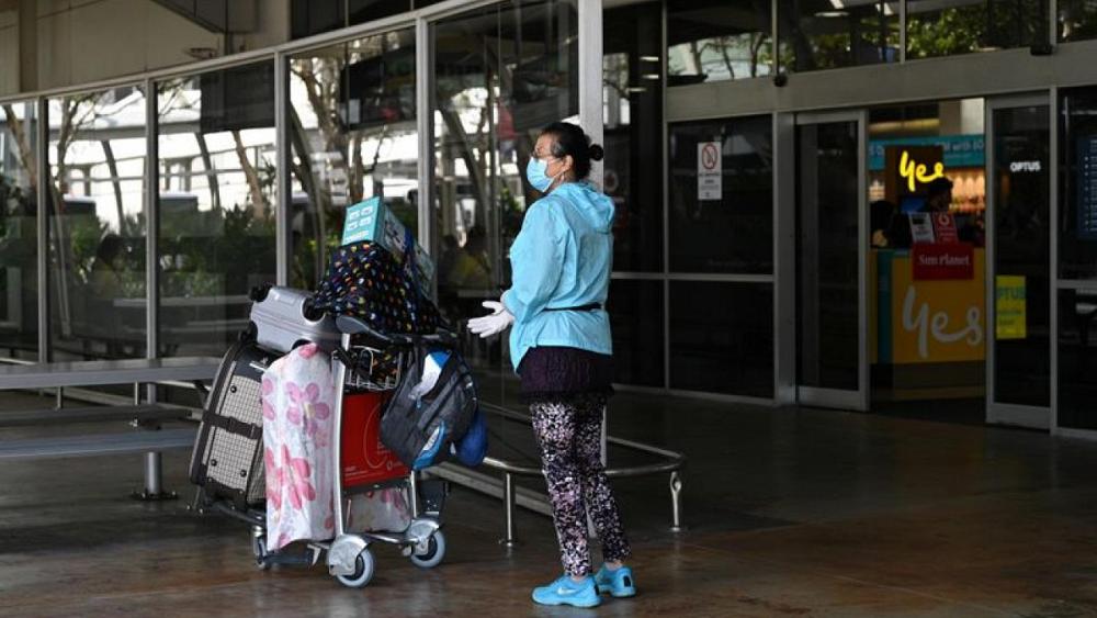 Australia sticks by plan to re-open border in mid-2022