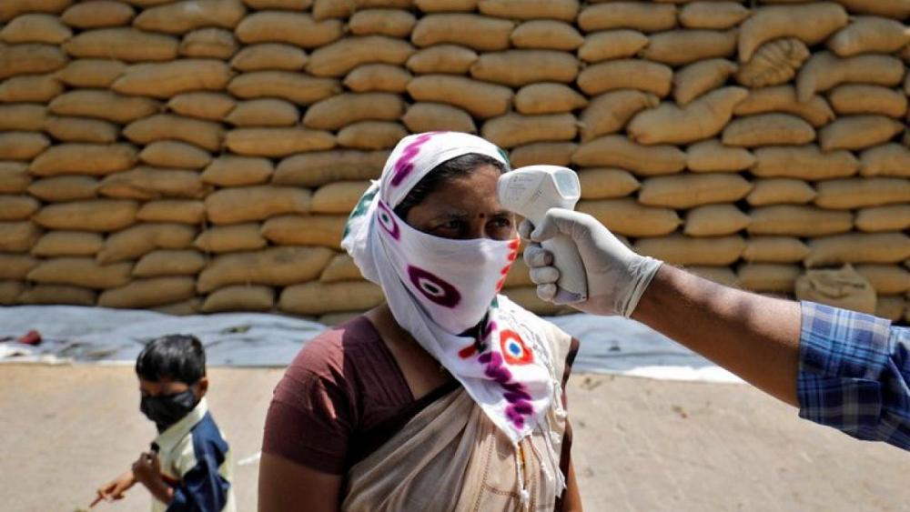 India reports 132,788 new COVID-19 infections, 3,207 deaths