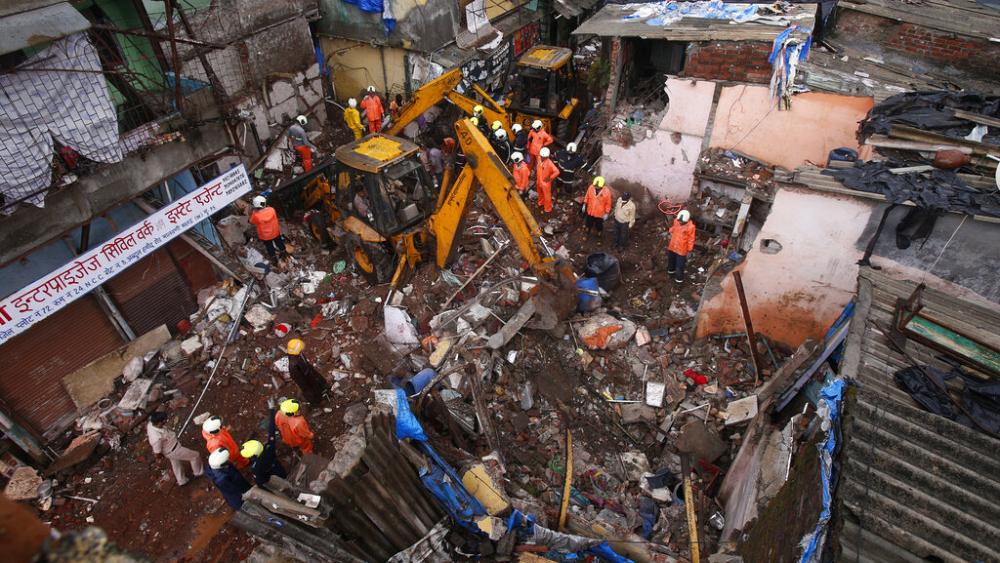 Building collapse kills 11 after monsoon flooding in Mumbai