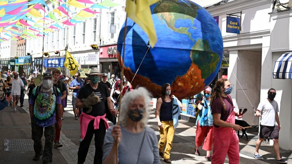 Environmental groups stage theatrical protests near to G7 leaders venue