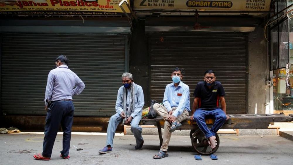 Alarm rises in India over COVID-19 risks as crowds return to malls and rail stations