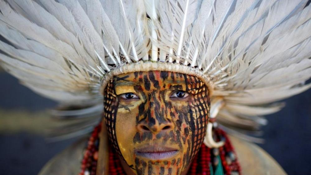 Firing arrows, indigenous people in Brazil protest bill curtailing land rights