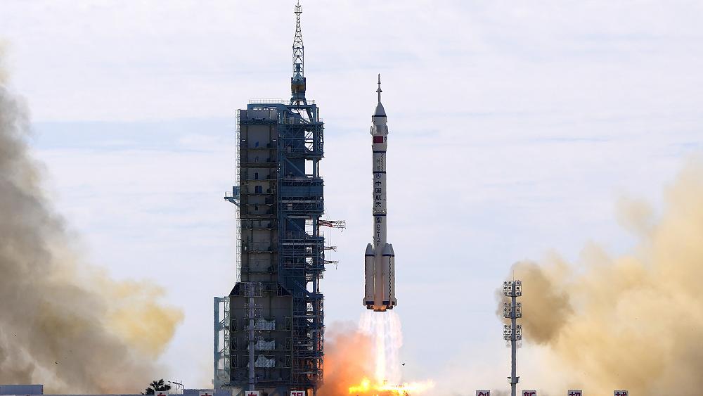 China launches first crew to live on new space station