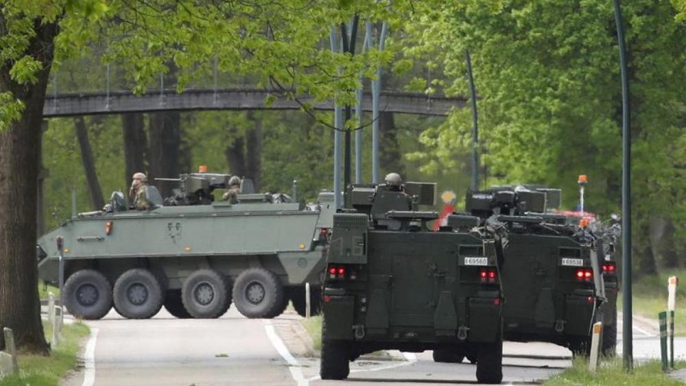 Body found of armed Belgian anti-vaccine fugitive, suicide suspected